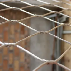 Сетка нержавеющая тросовая с параллельным узловым креплением и ромбической ячейкой Н2 7х7 AISI 316 20х35х1 мм